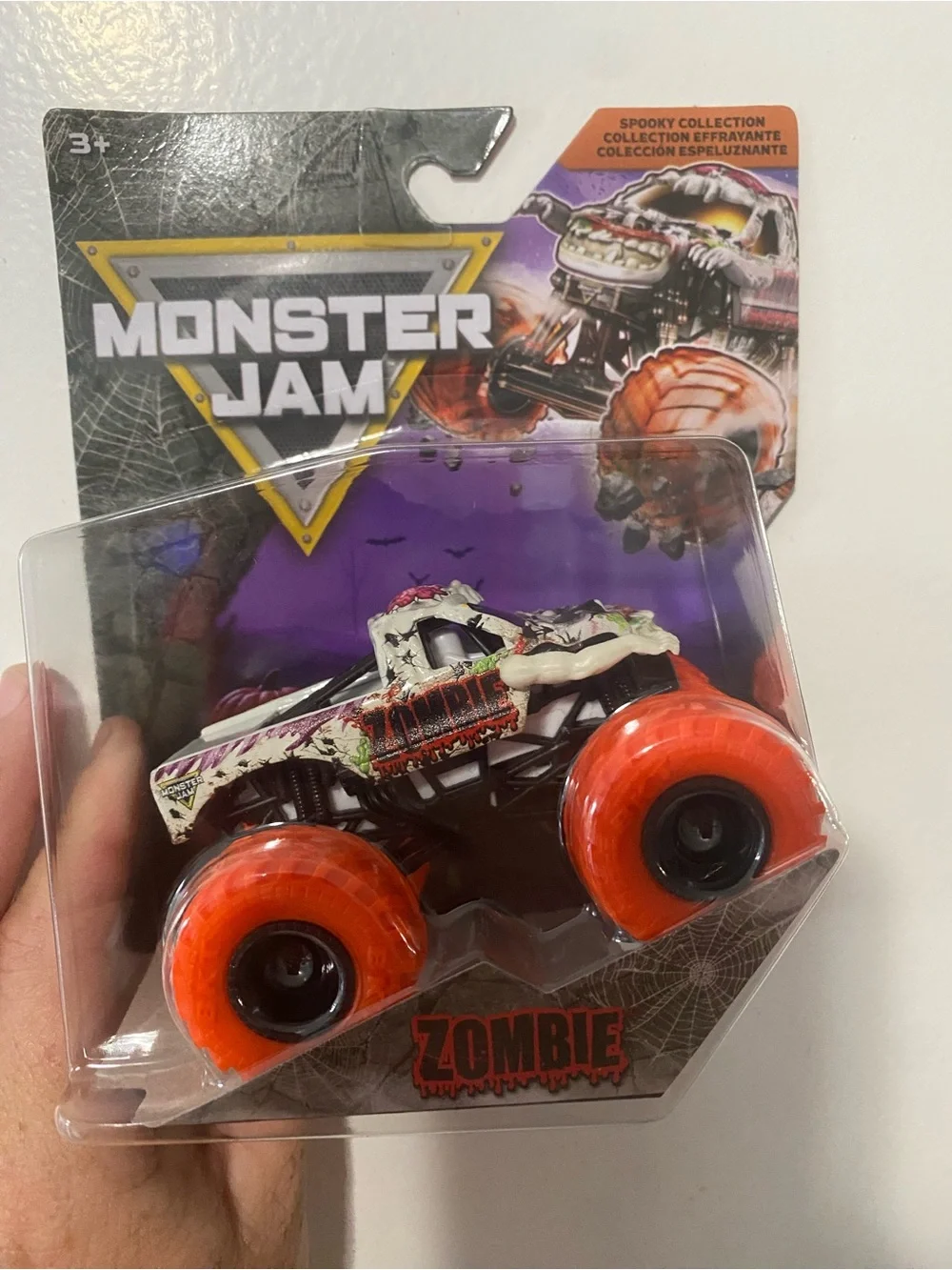 Monster Jam Zombie Monster Truck Toy - White Body with Orange Wheels